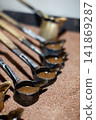 Rustic Turkish coffee ritual cezve brewing over heated sand Rustic Turkish coffee ritual cezve brewing over heated sand 141869287