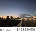 View of the cityscape at dusk from the overpass 141869459