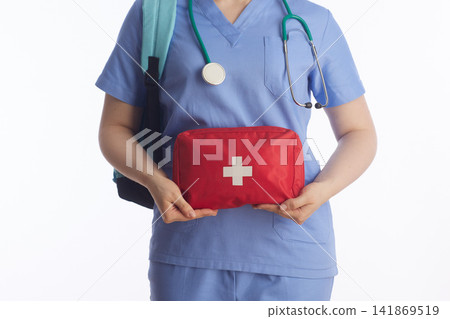 Clinical Preparedness with First Aid Kit and Medical Scrubs Clinical Preparedness with First Aid Kit and Medical Scrubs 141869519