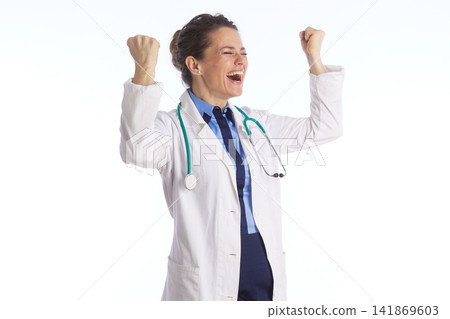 Cheerful Doctor Celebrating a Medical Breakthrough Cheerful Doctor Celebrating a Medical Breakthrough 141869603