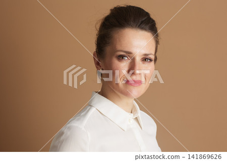 Approachable Businesswoman with Gentle Smile Approachable Businesswoman with Gentle Smile 141869626