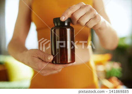 Showing Health Supplement Bottle for Daily Nutrition Showing Health Supplement Bottle for Daily Nutrition 141869885