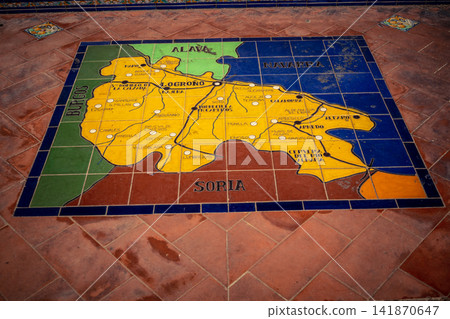 Close up of ceramic tile province map at the base of bench alcove at Plaza of Spain in Seville Close up of ceramic tile province map at the base of bench alcove at Plaza of Spain in Seville 141870647