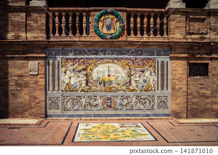 General view of ceramic tile bench alcove with coat of arms at Plaza of Spain in Seville General view of ceramic tile bench alcove with coat of arms at Plaza of Spain in Seville 141871010