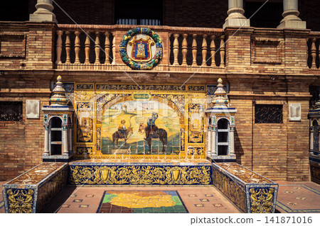 General view of ceramic tile bench alcove with coat of arms at Plaza of Spain in Seville General view of ceramic tile bench alcove with coat of arms at Plaza of Spain in Seville 141871016