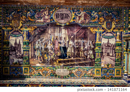 Close up of historic scene ceramic tile panel at Plaza of Spain in Seville Close up of historic scene ceramic tile panel at Plaza of Spain in Seville 141871164