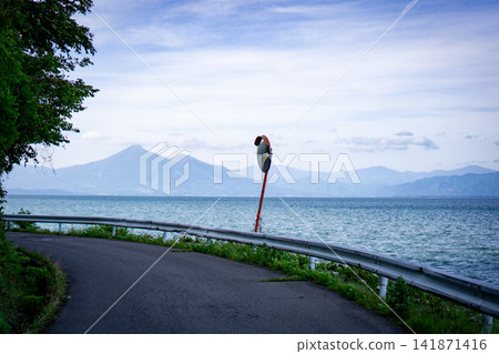 Lake Inawashiro and Mount Bandai as seen from the Konan-Minato Line. Lake Inawashiro and Mount Bandai as seen from the Konan-Minato Line. 141871416