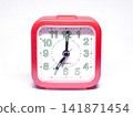 Red Retro Alarm Clock Showing 07:00 Time Isolated on Background Vintage Timepiece 141871454