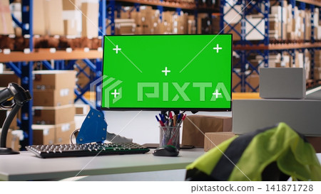 Empty warehouse space shows isolated chroma key display on pc, managing order processing and shipping e-commerce cargo goods. Storage room with racks and packages on shelves. 141871728