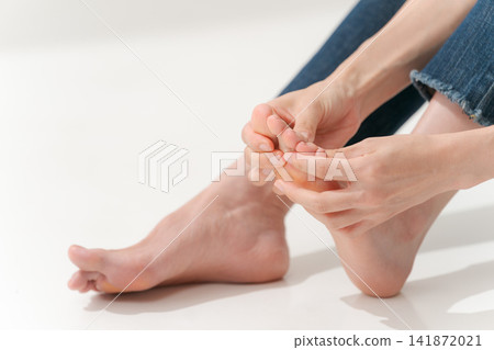 Women who massage their feet Women who massage their feet 141872021