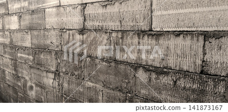 Textured lightweight concrete block wall Textured lightweight concrete block wall 141873167