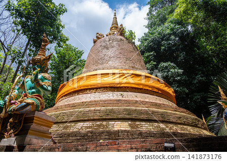 A brick stupa in Wat Champa temple in Chiang Khong district, Chiang Rai province, Thailand. Pagodas are built primarily for religious purposes mostly to enshrine sacred relics. A brick stupa in Wat Champa temple in Chiang Khong district, Chiang Rai province, Thailand. Pagodas are built primarily for religious purposes mostly to enshrine sacred relics. 141873176