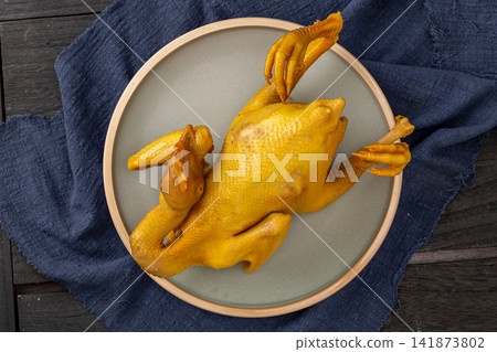 traditional Guangdong Hakka Salt Baked Chicken Whole Steamed Herbal Marinated Yellow Feathery Poultry traditional Guangdong Hakka Salt Baked Chicken Whole Steamed Herbal Marinated Yellow Feathery Poultry 141873802