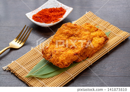 crispy Deep Fried Chicken Cutlet Sliced Golden Breaded Chicken Breast Creamy Sauce Topping crispy Deep Fried Chicken Cutlet Sliced Golden Breaded Chicken Breast Creamy Sauce Topping 141873810