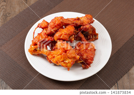 crispy Deep Fried Chicken Skeleton Bone In Seasoned Fried Poultry Carcass Snack crispy Deep Fried Chicken Skeleton Bone In Seasoned Fried Poultry Carcass Snack 141873834