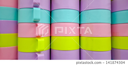 Stacked Pastel Colorful Plastic Cups Geometric Striped Pattern Stacked Pastel Colorful Plastic Cups Geometric Striped Pattern 141874304