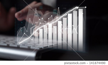 Financial Data Visualization with Graphs and Charts on a Keyboard, Showing Business Growth and Positive Trends in a Digital Workspace Copula Financial Data Visualization with Graphs and Charts on a Keyboard, Showing Business Growth and Positive Trends in a Digital Workspace Copula 141874490