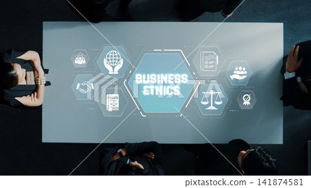 A top-down view of a conference table showcasing business ethics with digital icons, highlighting the importance of integrity and responsibility in corporate practices. Sigmoid A top-down view of a conference table showcasing business ethics with digital icons, highlighting the importance of integrity and responsibility in corporate practices. Sigmoid 141874581