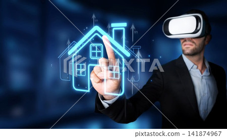 A businessman explores a digital house model using a virtual reality headset, showcasing the intersection of technology and real estate in a modern office setting. Sigmoid A businessman explores a digital house model using a virtual reality headset, showcasing the intersection of technology and real estate in a modern office setting. Sigmoid 141874967
