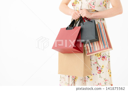 A woman shopping, her hands A woman shopping, her hands 141875562
