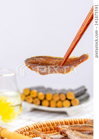 crispy Dried Fish Snack with Golden Fried Texture 141875591