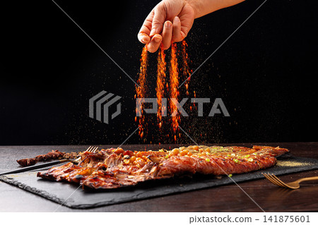 grilled Tilapia with Chili Powder Spicy Roasted Fish grilled Tilapia with Chili Powder Spicy Roasted Fish 141875601