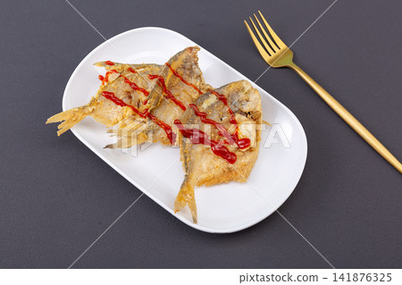 crispy Fried Small Fish Snack Golden Deep Fried Seafood 141876325