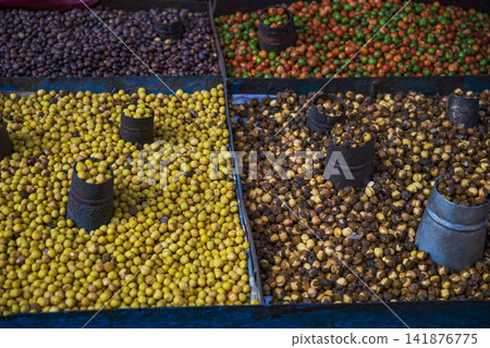 Roasted chickpeas and beans street food market display in Asia with copy space Roasted chickpeas and beans street food market display in Asia with copy space 141876775