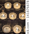 Rows of burning memorial votive candles inside Koelner Dom, Germany 141876878
