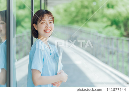 Young female nurse Young female nurse 141877344