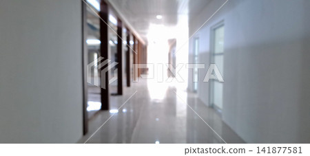 Out of Focus Blurred Modern Office Corridor Interior Perspective Out of Focus Blurred Modern Office Corridor Interior Perspective 141877581