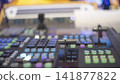 Video production switcher T-bar fader control panel with colorful buttons and copy space 141877822