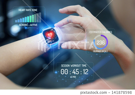 Cropped hand adjusting smartwatch with holographic fitness tracker interface Cropped hand adjusting smartwatch with holographic fitness tracker interface 141878598