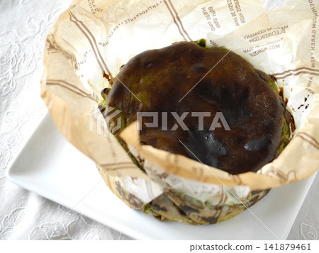 Freshly baked matcha Basque cheesecake Freshly baked matcha Basque cheesecake 141879461