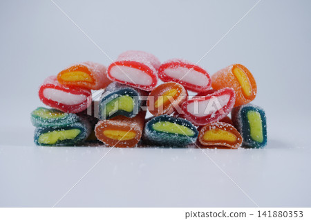 Colorful candy displayed on a plain white background Colorful candy displayed on a plain white background 141880353