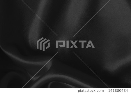 Black fabric cloth texture for background and design art work, beautiful crumpled pattern of silk or linen. Black fabric cloth texture for background and design art work, beautiful crumpled pattern of silk or linen. 141880484