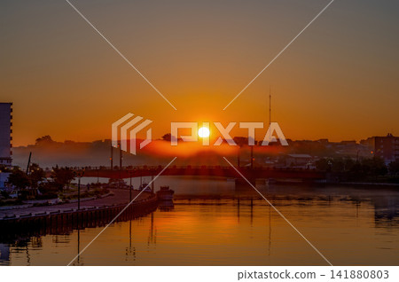 Morning mist and sunrise Morning mist and sunrise 141880803