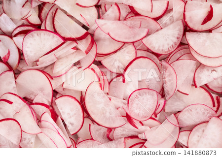 Sliced radishes on the table Sliced radishes on the table 141880873