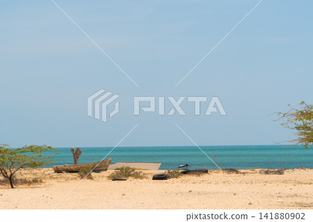 Old Fishing Boats on Desert Beach in Cabo de la Vela, La Guajira Old Fishing Boats on Desert Beach in Cabo de la Vela, La Guajira 141880902
