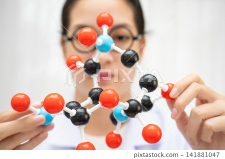 Molecules chemical on a periodic table background. Molecules chemical on a periodic table background. 141881047