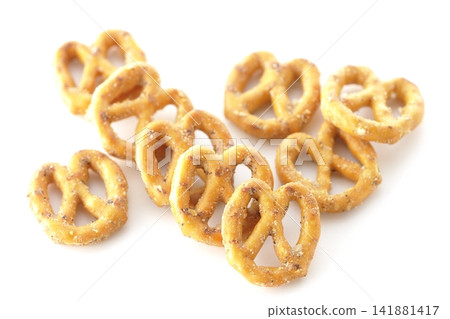 A pretzel photographed against a white background. A pretzel photographed against a white background. 141881417