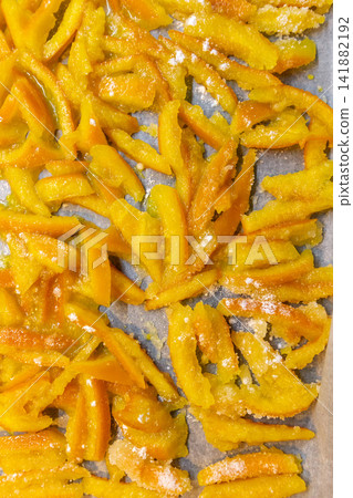 Top view of homemade candied orange peels drying Top view of homemade candied orange peels drying 141882192
