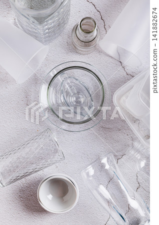 Microplastics as a public health issue, using glass instead of plastic top and vertical view 141882674