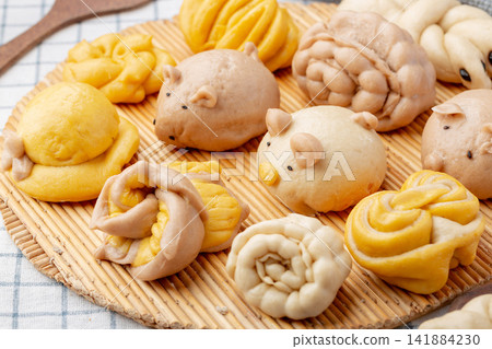 assorted traditional festive flower mo steamed buns with animal shapes assorted traditional festive flower mo steamed buns with animal shapes 141884230