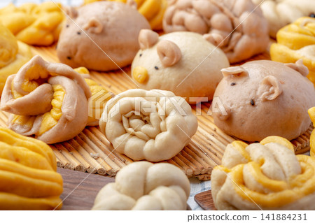 assorted traditional festive flower mo steamed buns with animal shapes assorted traditional festive flower mo steamed buns with animal shapes 141884231