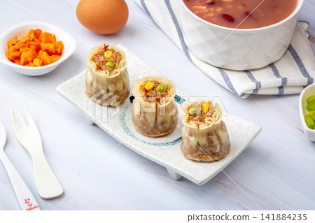 steamed glutinous rice shumai dumpling with savory meat filling steamed glutinous rice shumai dumpling with savory meat filling 141884235
