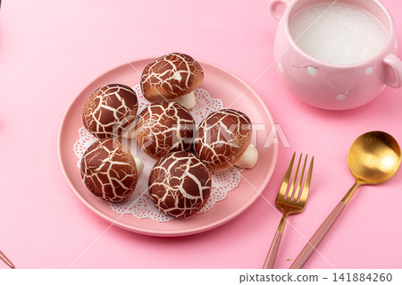 creative mushroom shaped steamed buns with sweet custard filling creative mushroom shaped steamed buns with sweet custard filling 141884260