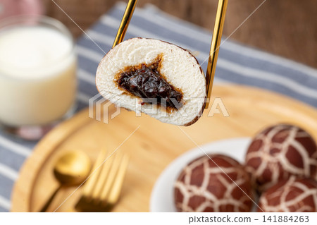 creative mushroom shaped steamed buns with sweet custard filling creative mushroom shaped steamed buns with sweet custard filling 141884263