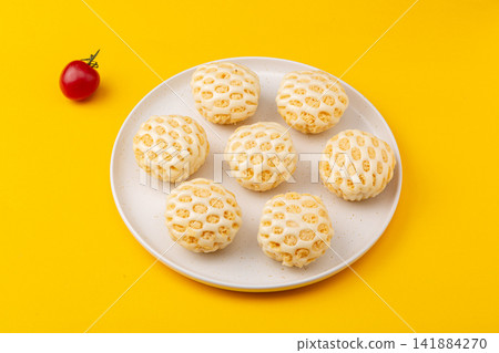 unique honeycomb shaped steamed buns stuffed with savory pork floss unique honeycomb shaped steamed buns stuffed with savory pork floss 141884270