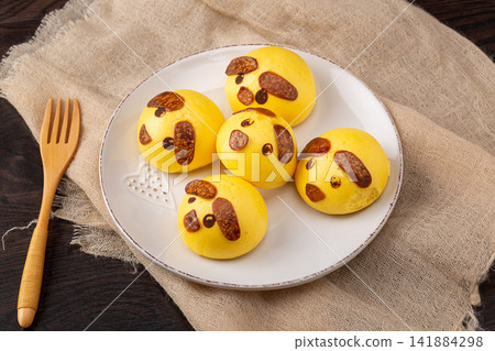 creative cute puppy dog shaped steamed buns with custard filling creative cute puppy dog shaped steamed buns with custard filling 141884298